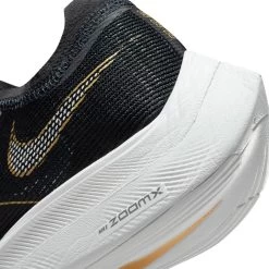 Nike Women's ZoomX Vaporfly Next % 2 Racing Shoe - Black/White/Metallic Gold Coin - Regular (B) 17 Nike Women's ZoomX Vaporfly Next % 2 Racing Shoe - Black/White/Metallic Gold Coin - Regular (B) -Women Shoes Shop CU4123 001 PHSYD002 1500